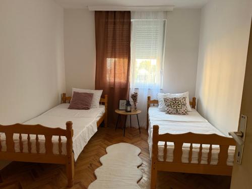 Postel nebo postele na pokoji v ubytování Apartman MILICA, Bileća