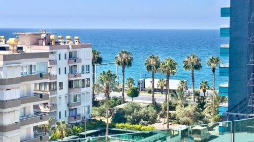 a view of the ocean from a building at 2-х комнатная квартира в ЖК класса Luxe, Тосмур in Alanya