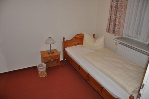 Postel nebo postele na pokoji v ubytování Hotel-Café Kampe