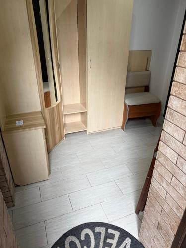 an empty room with a door and a floor at Квартира в центрі in Chernivtsi