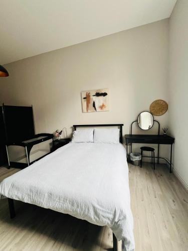 Ένα ή περισσότερα κρεβάτια σε δωμάτιο στο The Tower Suite