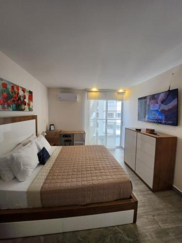 Postel nebo postele na pokoji v ubytování Cartagena Exclusive Apartment with Jacuzzi