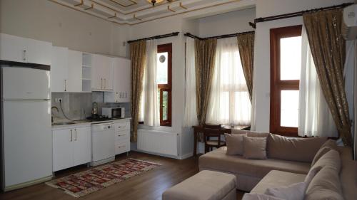 Kuchyň nebo kuchyňský kout v ubytování Blue Eye Suites