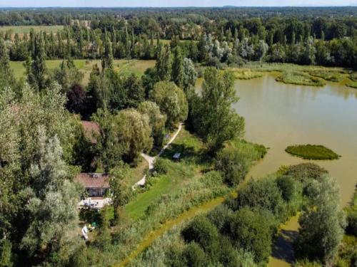an aerial view of a house next to a lake at Holiday Home in Gargas with Pool and Nature in Gargas