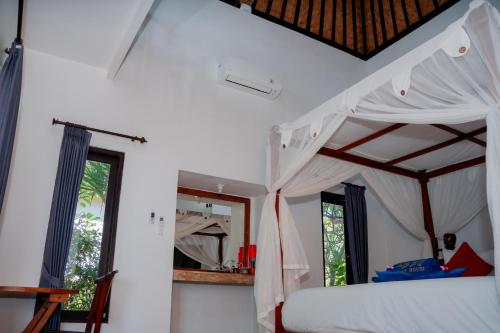 Ένα ή περισσότερα κρεβάτια σε δωμάτιο στο The BBQ Guest House
