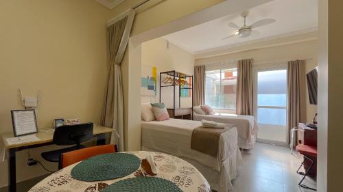Ένα ή περισσότερα κρεβάτια σε δωμάτιο στο Apart Hotel Bena Flamboyant ap 2 - próx Shopping Iguatemi