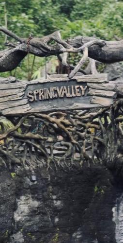 a sign that says spring valley on the back of a bike at Spring Valley in Anachal