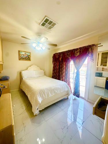 a bedroom with a bed and a window at Shadow Cove Property in Las Vegas