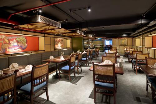 Un restaurante u otro lugar para comer en Solaria Tesori Hotel