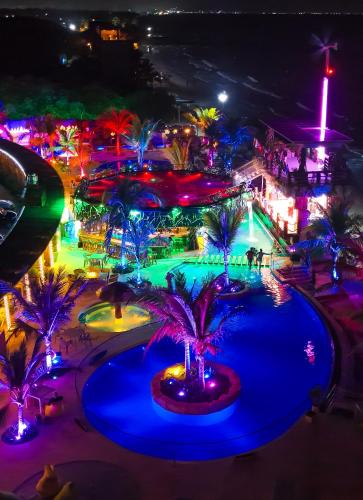 an aerial view of a theme park at night at Suite Brisa Mulata en Laguna Beach, Tolú in Tolú