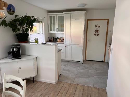 Kuchyň nebo kuchyňský kout v ubytování Unsere Haus