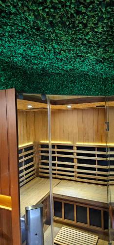 a empty gym with a green ceiling at Deluxe Seaview Chalet 6 by Palm Beach Chalets in Palm Beach