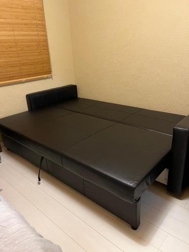 Guesthouse Yaggy 壱にあるベッド