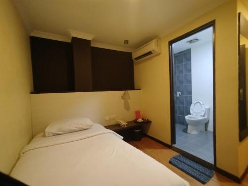 Ένα μπάνιο στο Hotel De Grand Orchard