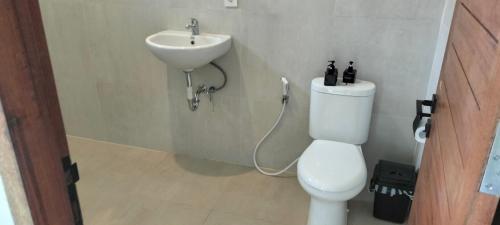 Ein Badezimmer in der Unterkunft Trawangan Oasis