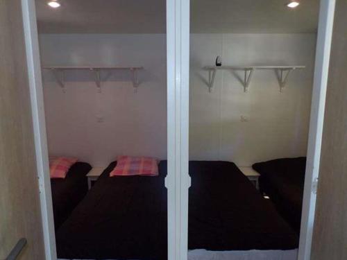 Φωτογραφία από το άλμπουμ του Mobil Home avec Terrasse, 3 Chambres, 6 Pers. - API-1-52-247 σε La Cassagne