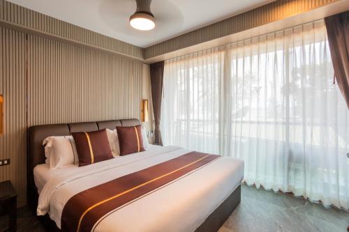 Katil atau katil-katil dalam bilik di The Legacy V Beach Resort Ao Nang Krabi, Aspira Collection - Adults only