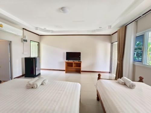 Katil atau katil-katil dalam bilik di บุรีสอร์ต บุรีรัมย์ Burisort Burirum