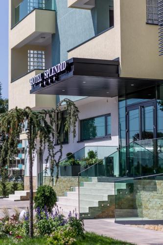 a building with a sign that reads hotel sandwich at New Splendid Hotel & Spa - Adults Only (+16) in Mamaia