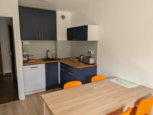 Η κουζίνα ή μικρή κουζίνα στο Appartement sur le port de la Roche Bernard 2chambres