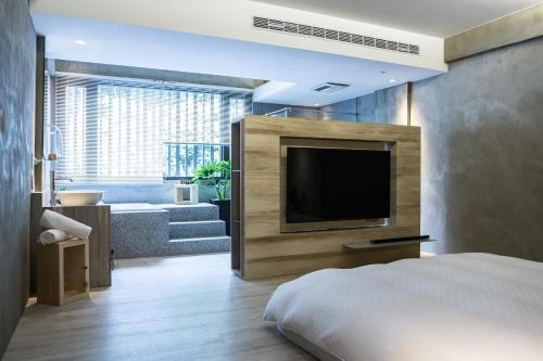 Llit o llits en una habitació de Shaoguang 188