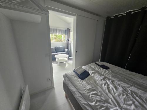 Postel nebo postele na pokoji v ubytování Aurora Jukkas Lodge 2 - Arctic Suite