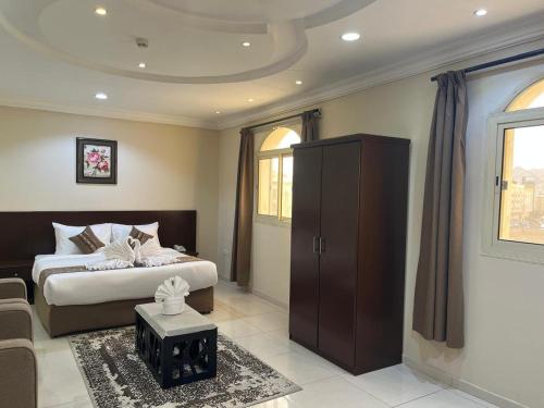 Postel nebo postele na pokoji v ubytování REST inn HOTEL 2