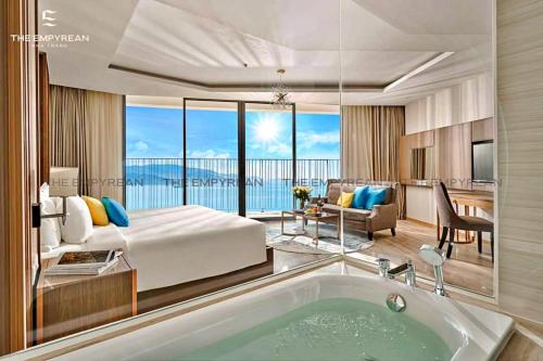 a bedroom with a bed and a bath tub at S79 Residence LYN Panorama in Nha Trang