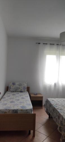 Postel nebo postele na pokoji v ubytování CasaGio'