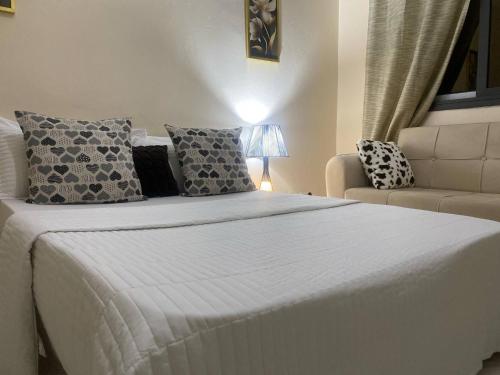 Katil atau katil-katil dalam bilik di Chambre meublée, wifi , serviettes, café ou thé offert