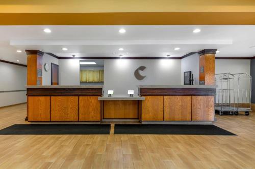 a lobby of a hospital with a reception desk at Comfort Inn & Suites Akron South in Akron
