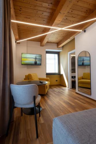 a living room with a couch and a table at The Crispi House in Vasto
