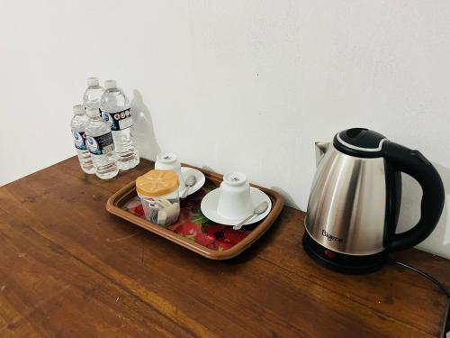 Příslušenství pro přípravu čaje a kávy v ubytování Nature Lover's Inn