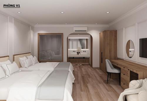 a bedroom with a large white bed and a desk at Villa Oasis in Luang Prabang