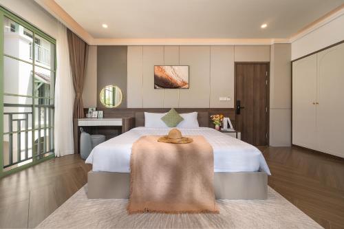 Кровать или кровати в номере Elyday Villa - Bai Khem Beach, Phu Quoc