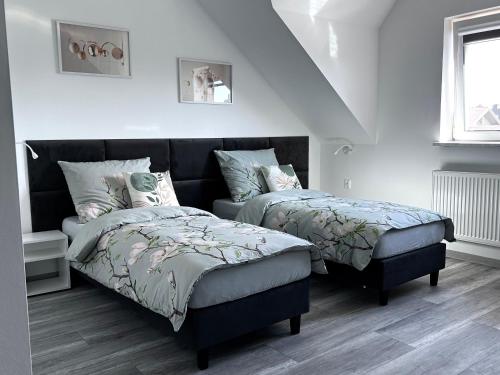 Postel nebo postele na pokoji v ubytování AP Apartament