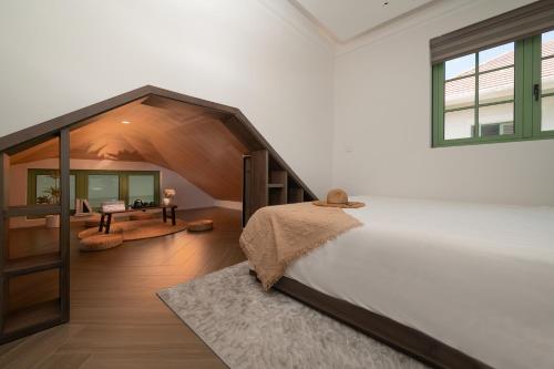 Кровать или кровати в номере Elyday Villa - Bai Khem Beach, Phu Quoc