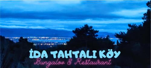 a sign that readsida tata tataatil koylezlezlez at İda Tahtalıköy Bungalov in Edremit