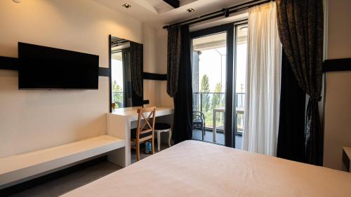 Katil atau katil-katil dalam bilik di Çanakkale Ornella Otel