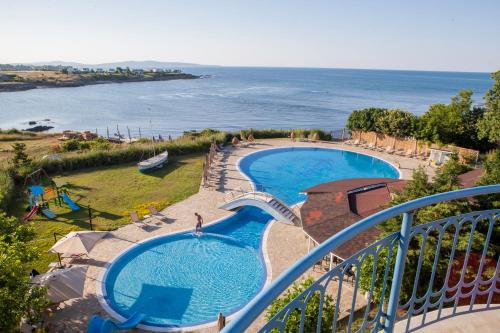 a view of a swimming pool from a balcony at Arapya Sun Resort in Arapya