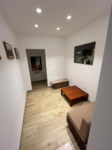 a living room with a couch and a table at B&B Marina Bay in Pineto