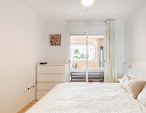 En eller flere senge i et værelse på El Rinconcito de Vera Playa-Almería