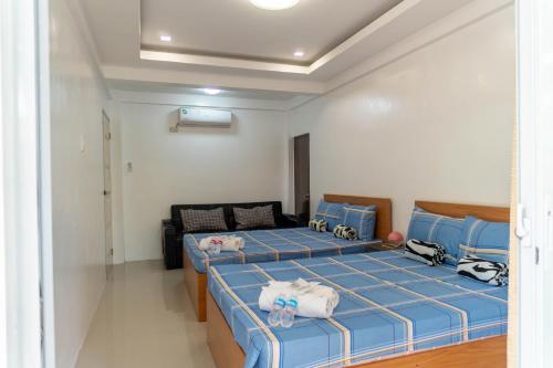 Katil atau katil-katil dalam bilik di Balay Marino