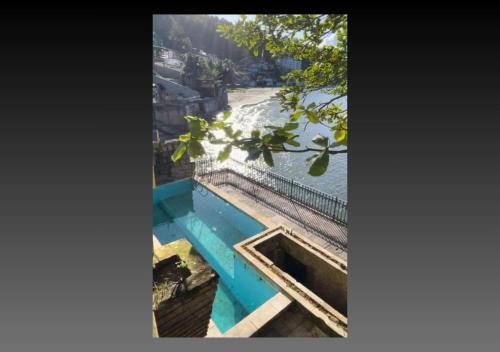 a view of the river from the roof of a building at Pousada Prainha do Horizonte in São Vicente