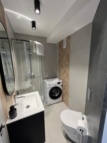 Et badeværelse på Nowoczesny Apartament Centrum przy PKP