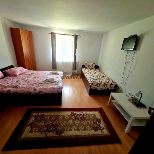 Postel nebo postele na pokoji v ubytování Lepsa home