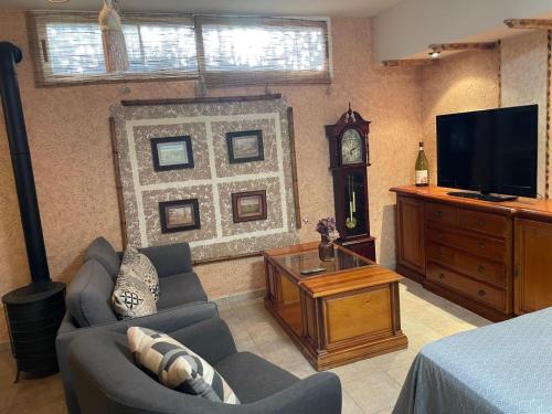 TV a/nebo společenská místnost v ubytování Casa Xime, relax y playa