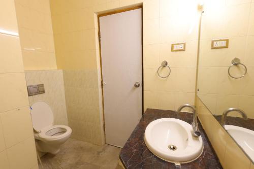 Koupelna v ubytování Hotel PLR Grand