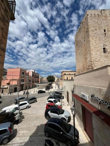a group of cars parked in a parking lot at Casa Ale in Bisceglie