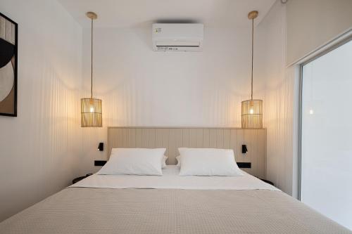 Ένα ή περισσότερα κρεβάτια σε δωμάτιο στο Imbros Villas I "Free" Heated Pools in mountains!